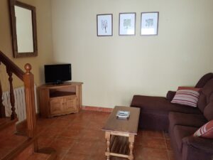 Salón apartamento 4 de los Apartamentos Rurales la Escuela